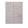 Soft ivory Berber rug handwoven from Atlas wool with thick pile and minimal design