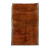 Artisan Moroccan rug in copper with geometric border and handwoven wool texture