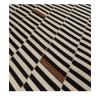 Mazandaran Noir custom hand woven flatweave in black and ivory stripes with subtle terracotta and indigo accents by Nasiricarpets