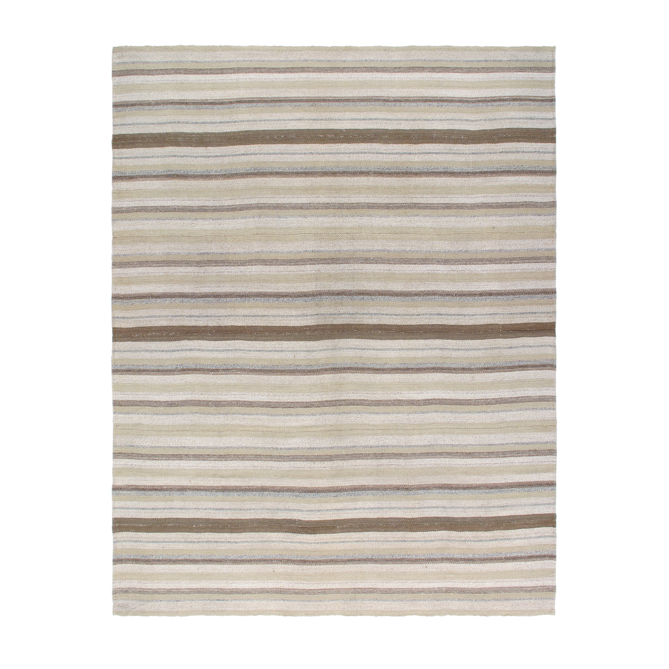 This Pelas flatweave rug is made with handspun wool and natural dyes.
