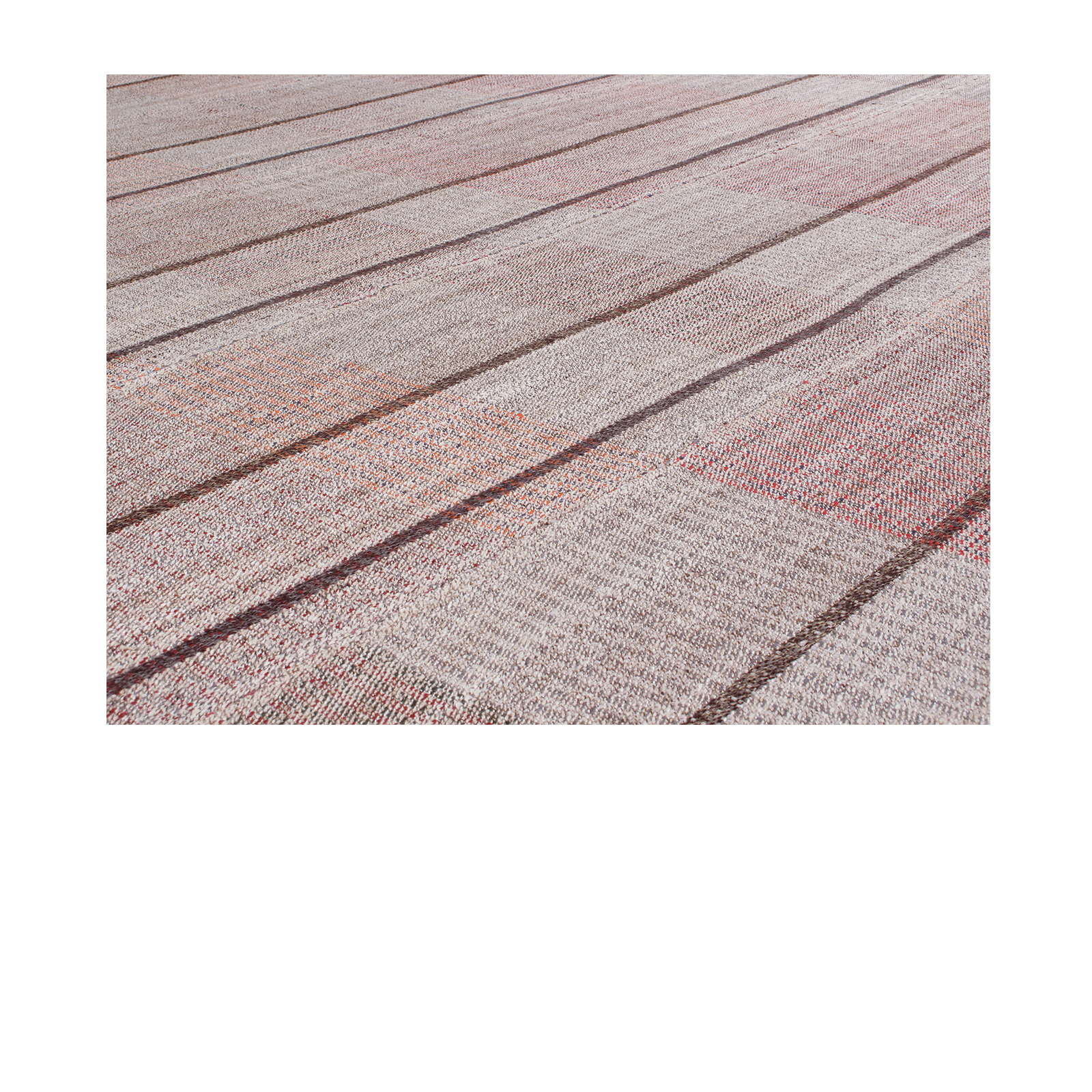 Pelas flatweave rug that is made with handspun wool and natural dyes