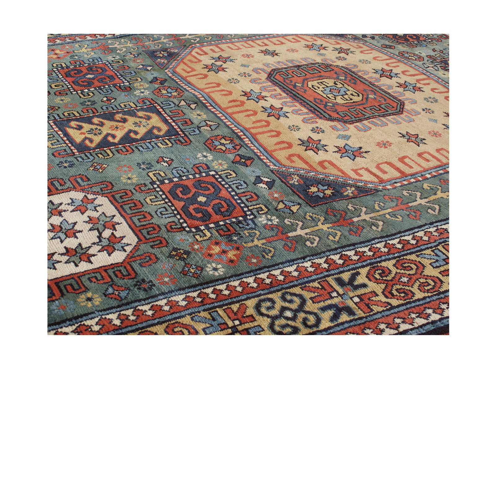This Kazak rug is constructed of 100% handspun wool and natural dyes. 