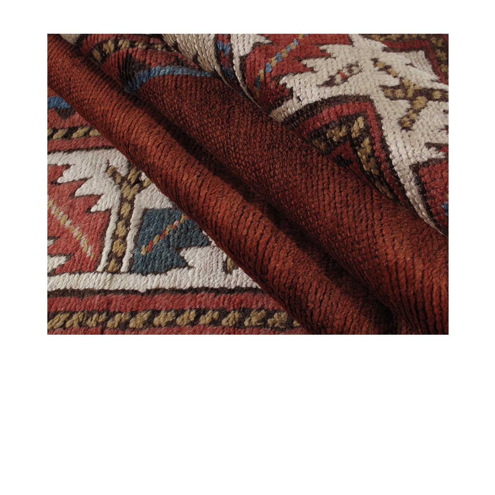 This Kurdish rug  is crafted using hand-carded Persian wool and natural dyes.
