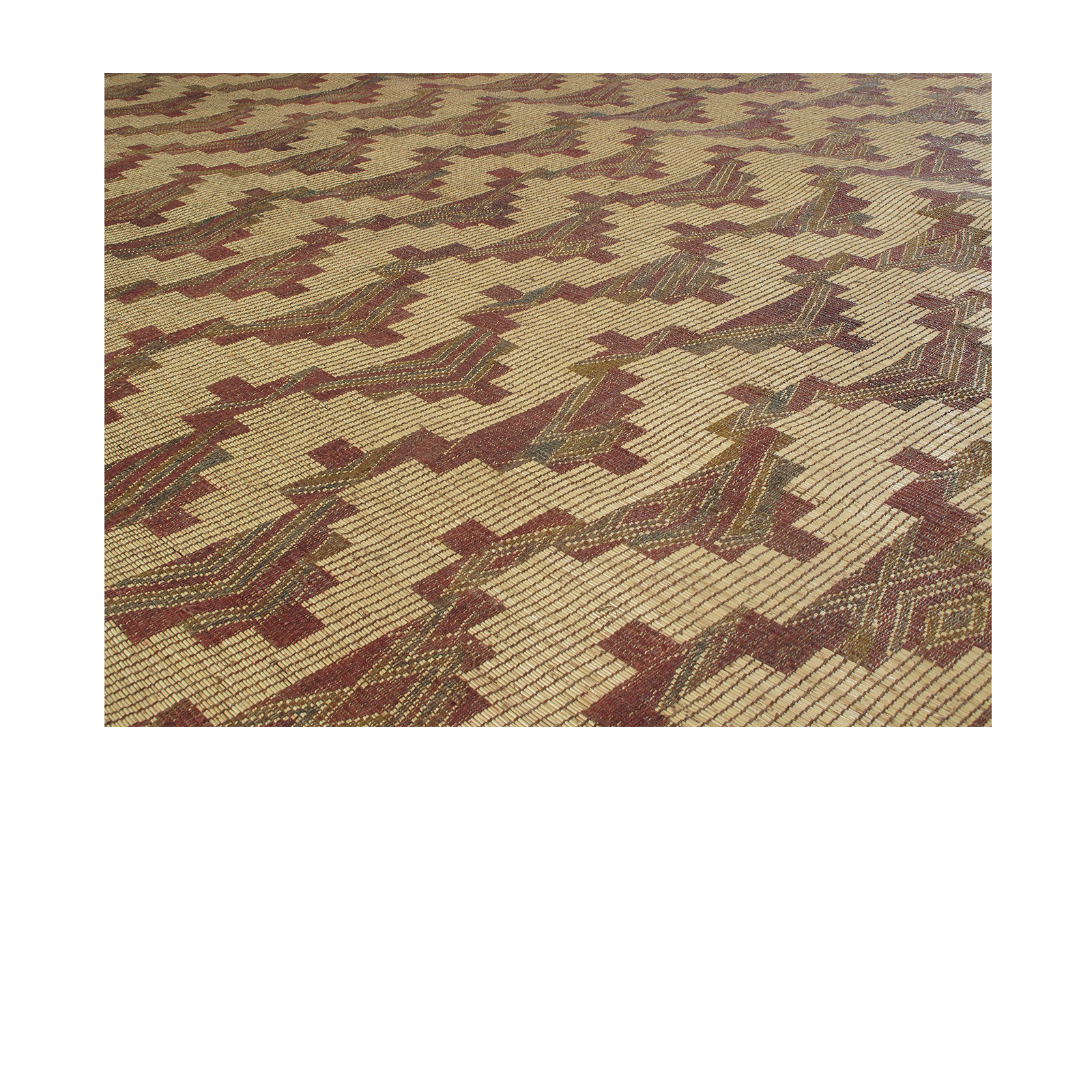 This Tuareg mat is hand-woven and made of palm,reeds and leather. 