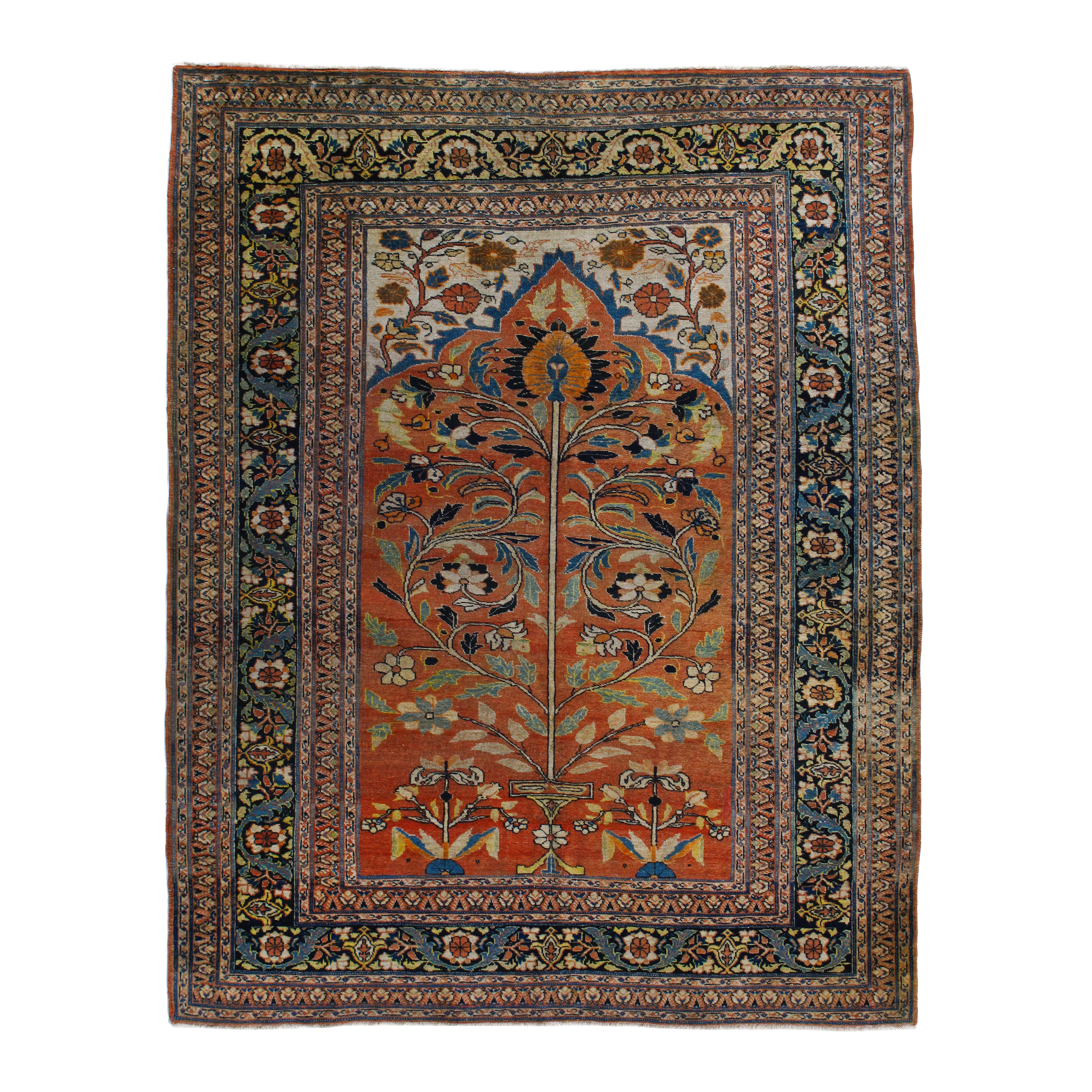 This antique Tabriz rug is hand-knotted and made of wool.
