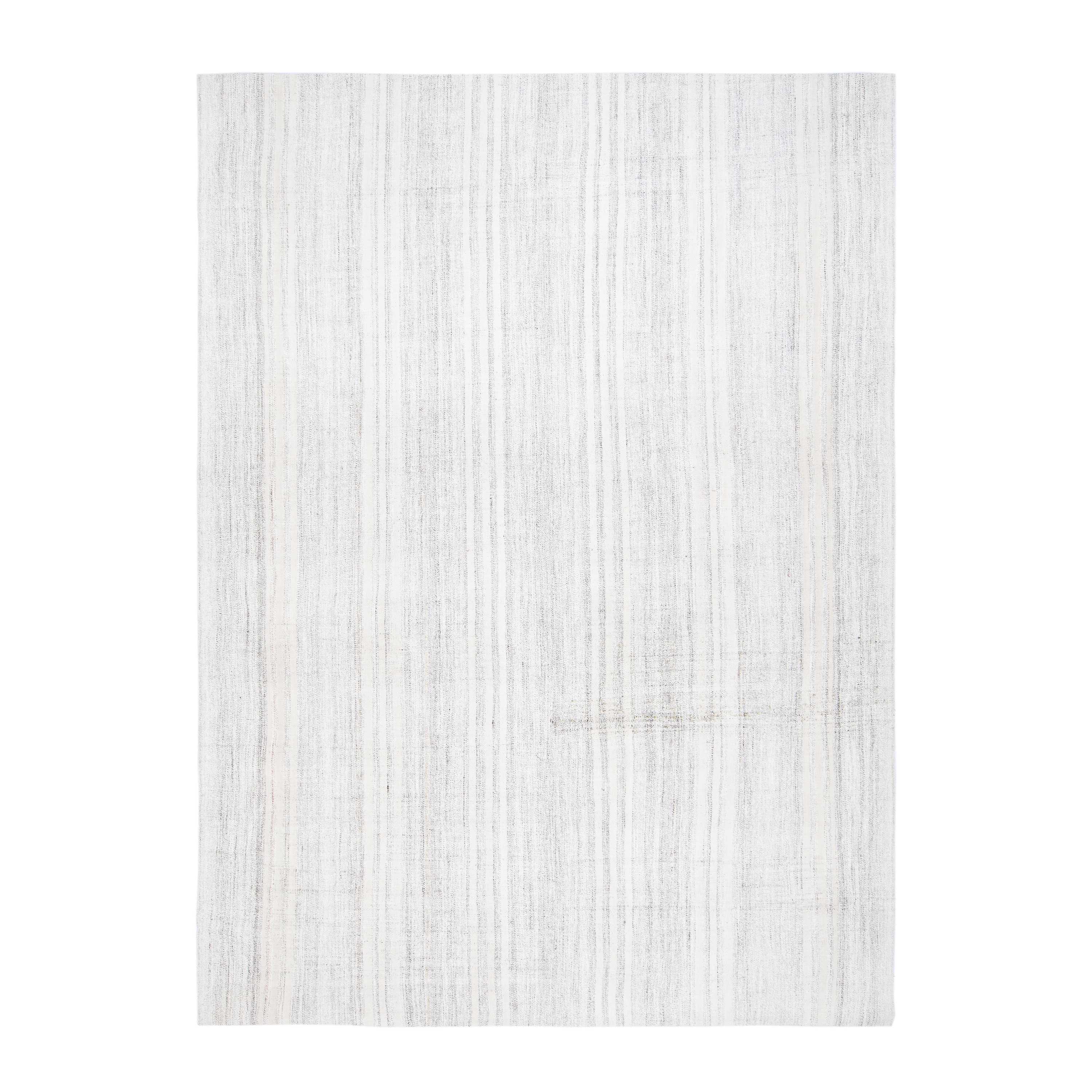 This flatweave Stripe rug is hand-woven and made with 100% wool.