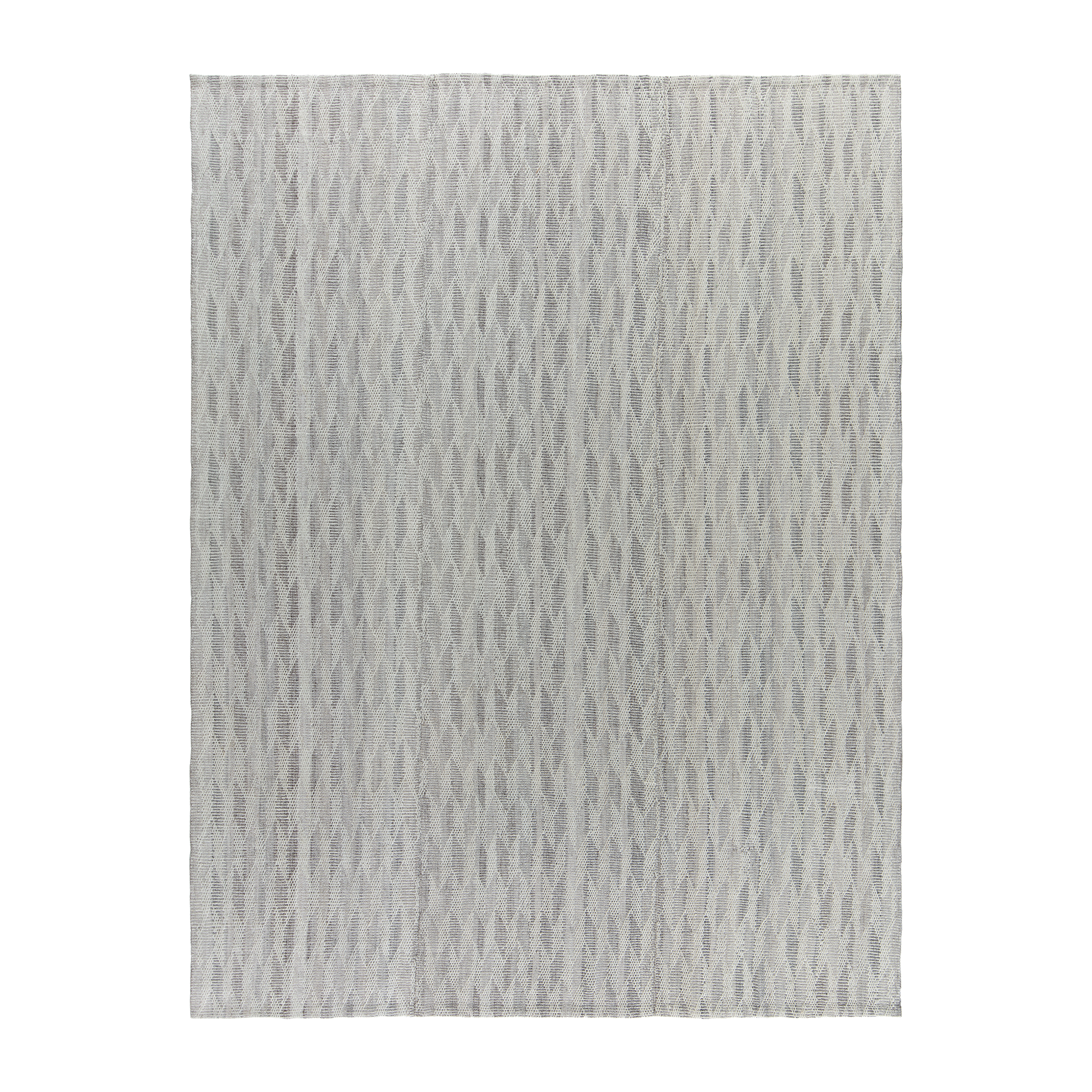 This Pelas Spearhead flatweave rug is made with handspun wool and natural dyes.