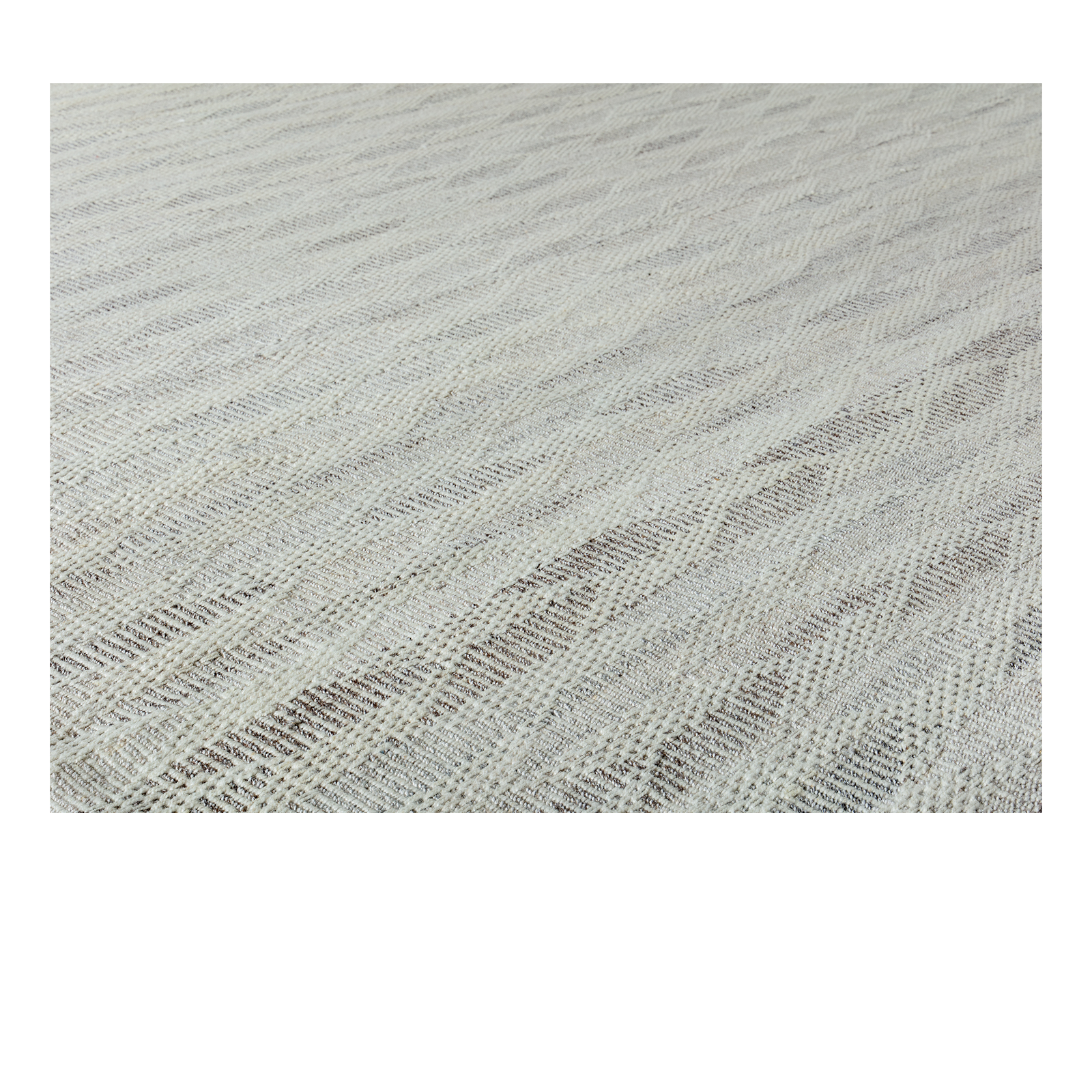 This Pelas Spearhead flatweave rug is made with handspun wool and natural dyes.
