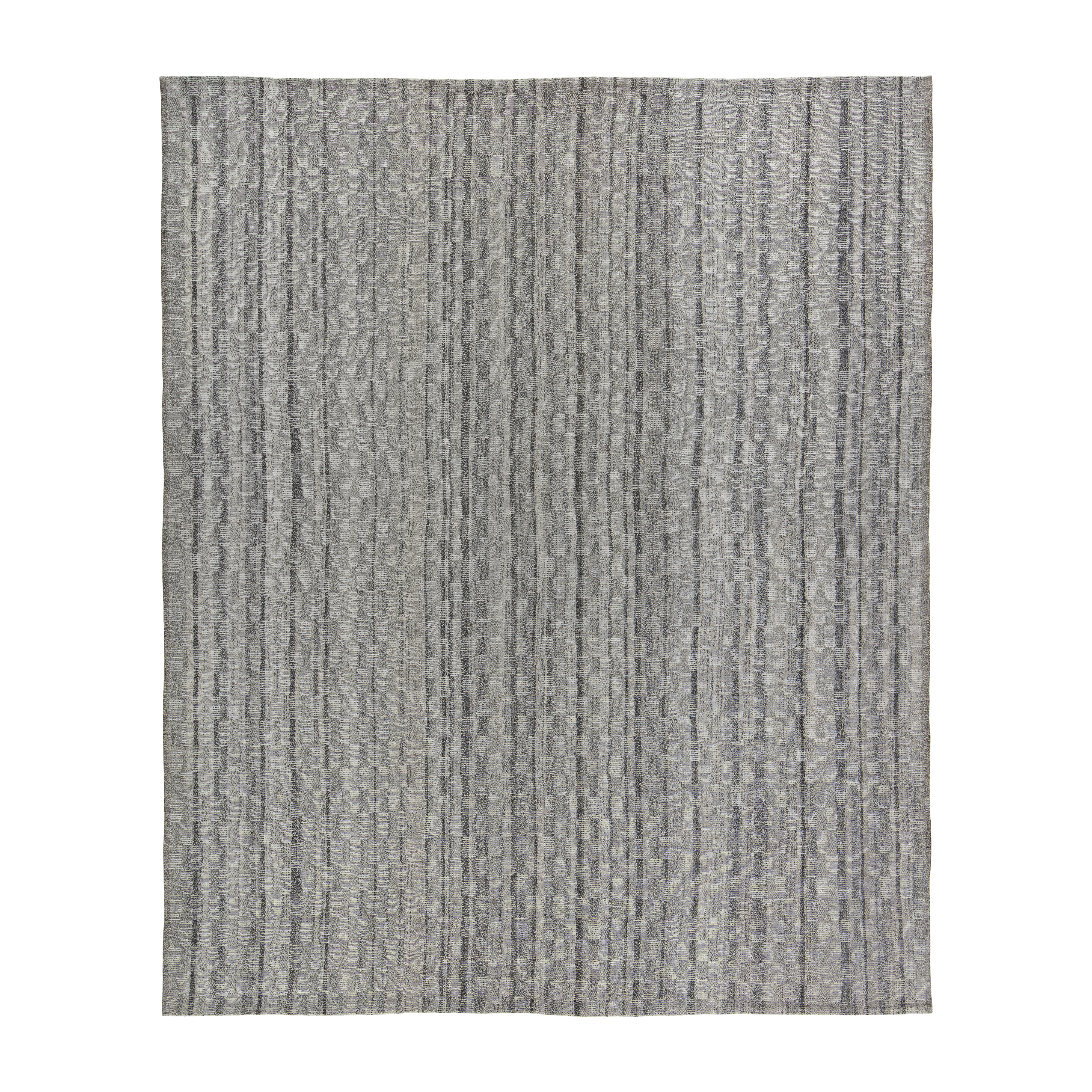 This Pelas Charmo flatweave rug is made with handspun wool and natural dyes. 