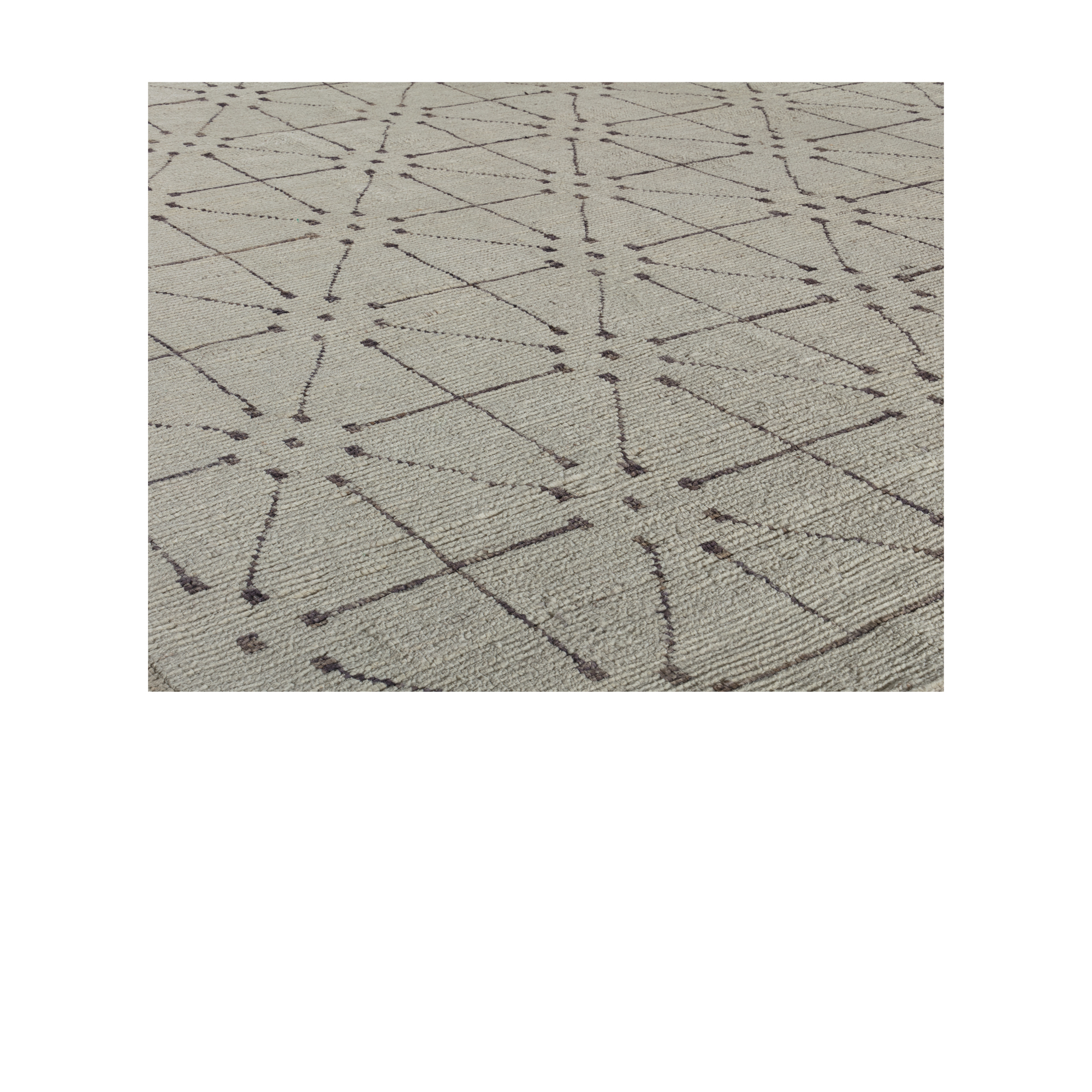 Our Trellis rug  is hand-knotted, and made from the finest hand-carded, hand-spun naturally dyed wool with silk accent.