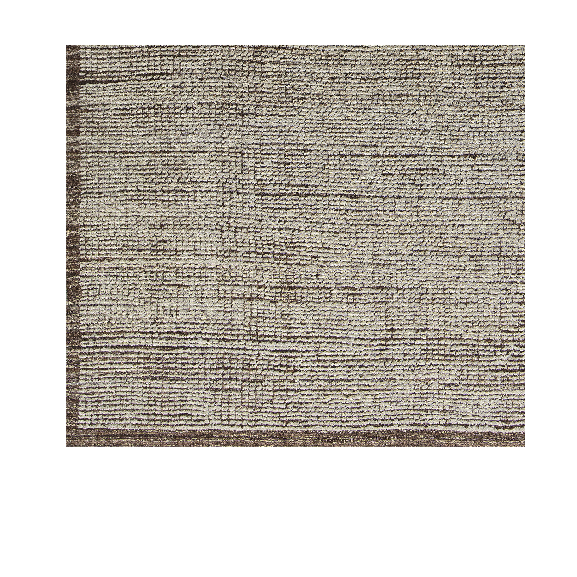 Our Relief rug is hand-knotted, and made from the finest hand-carded, hand-spun naturally dyed wool with silk accent.