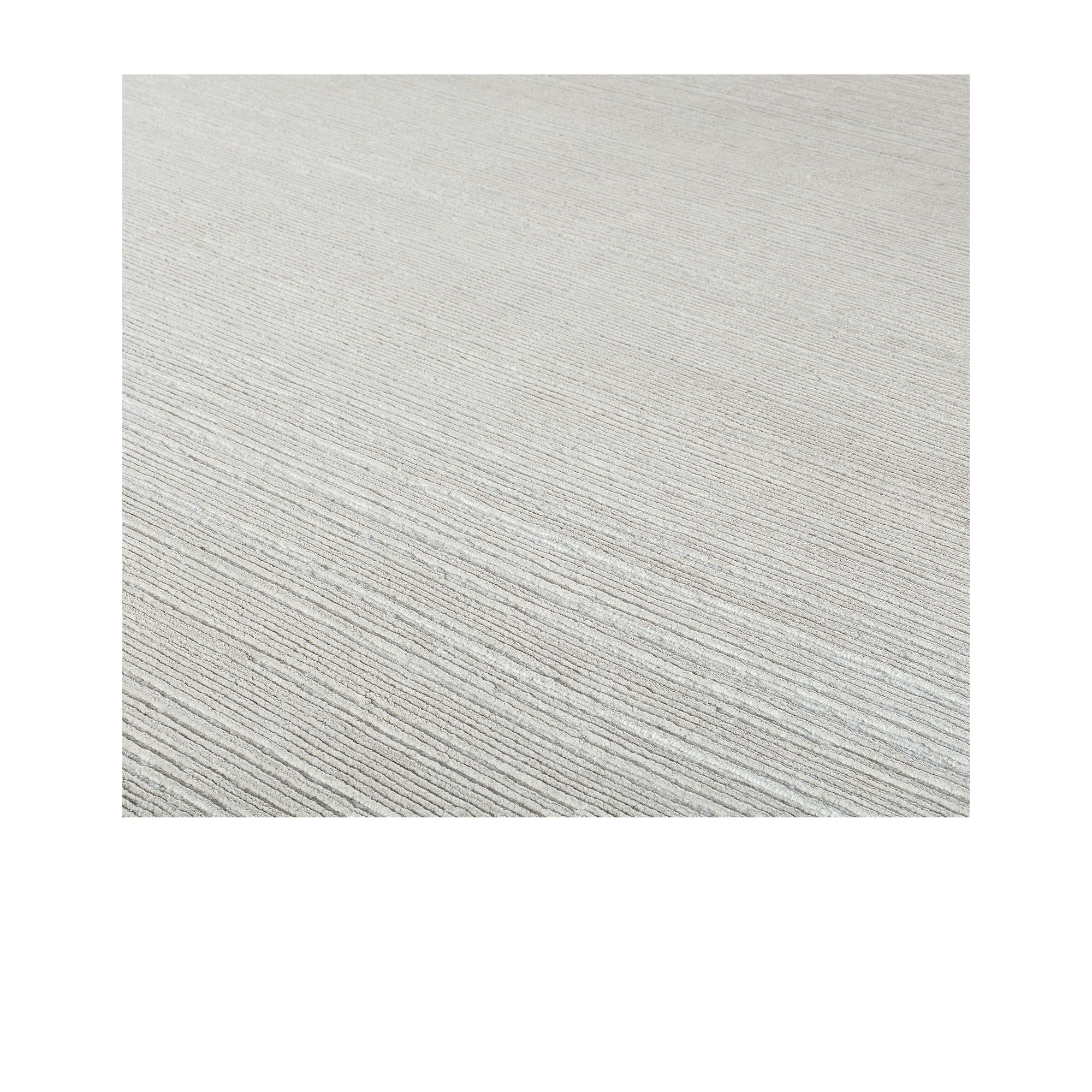 Our Staggered rug is hand-knotted in Nepal. using the finest hand-spun naturally dyed wool and silk.