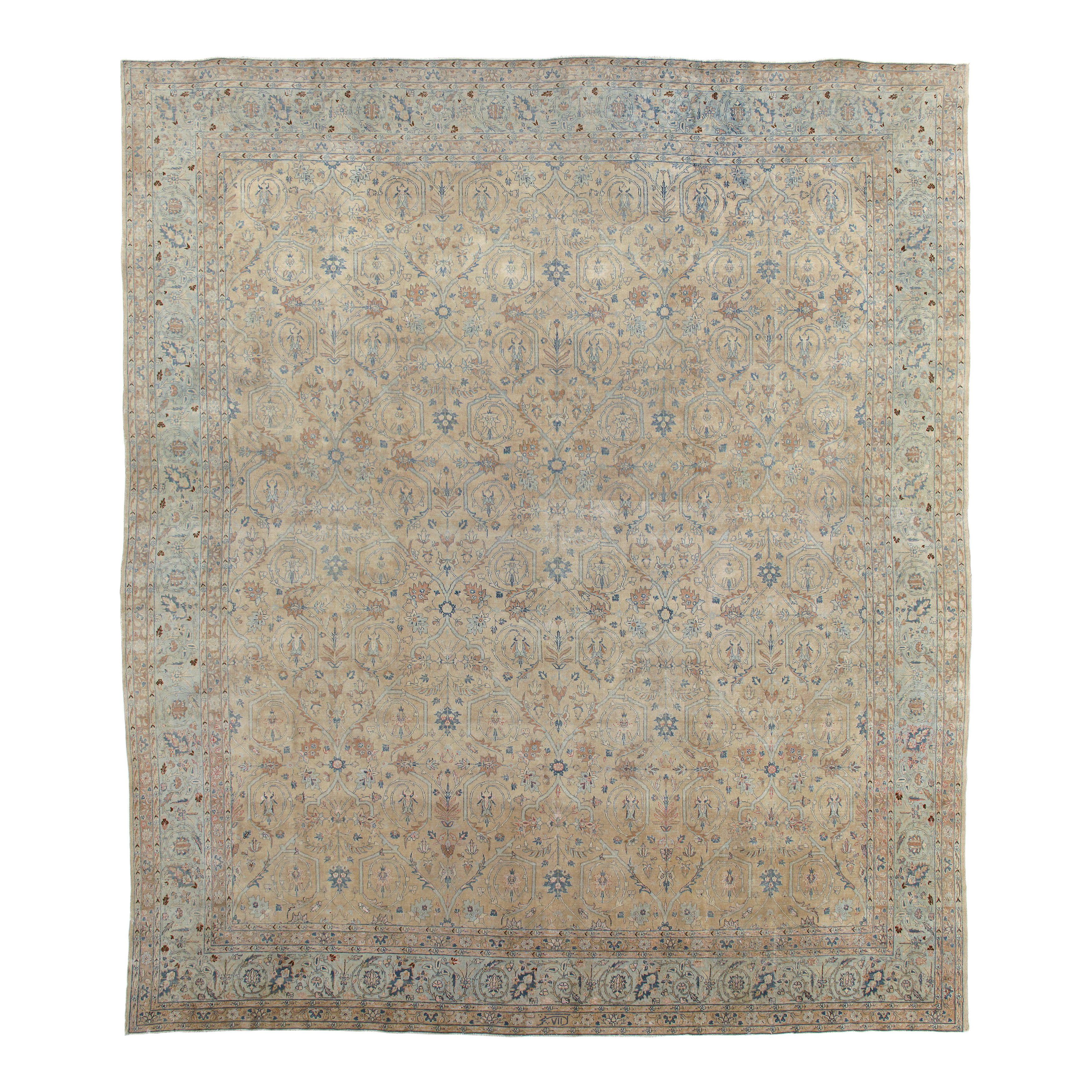 This Tabriz rug is hand-knotted and made of 100% wool. 