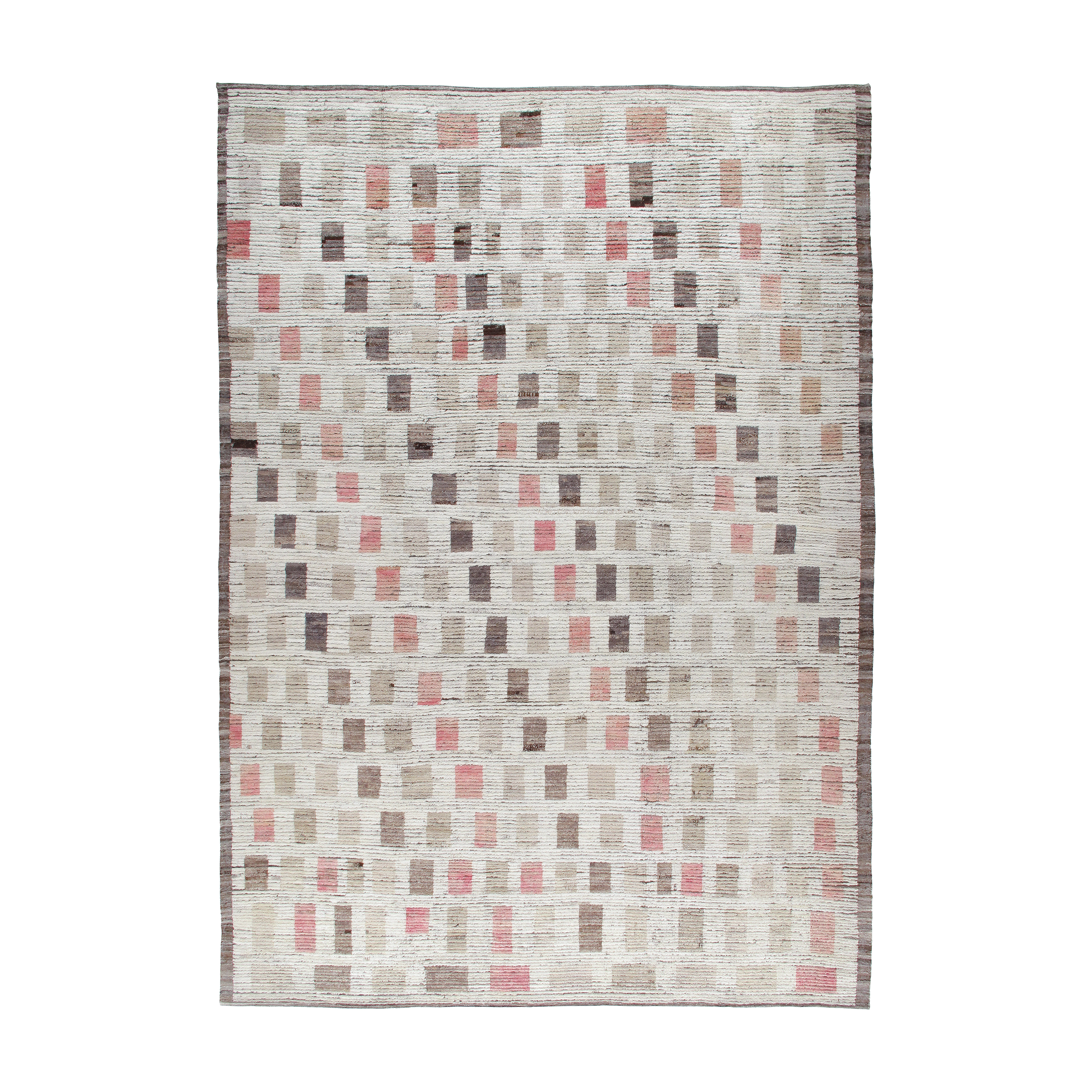 This Block rug is hand-knotted and made of 100% wool.