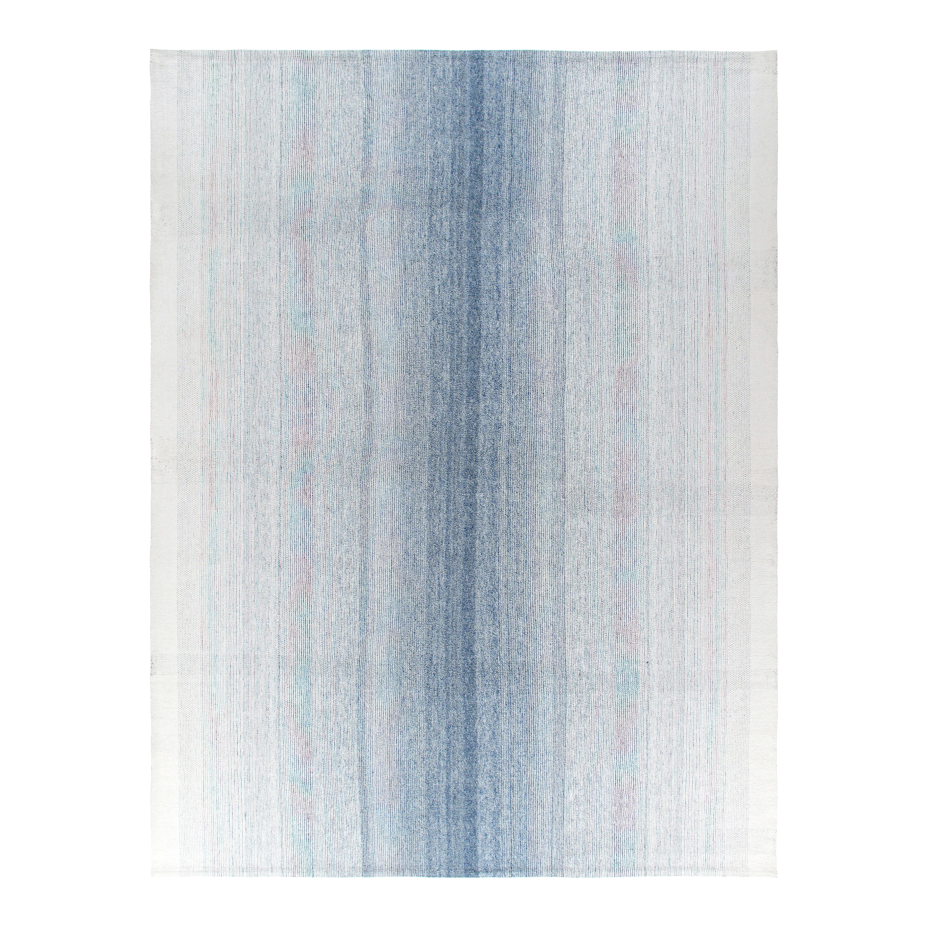 Ombre Pelas rug is a flatweave made with natural dyes, handspun wool, and cotton.