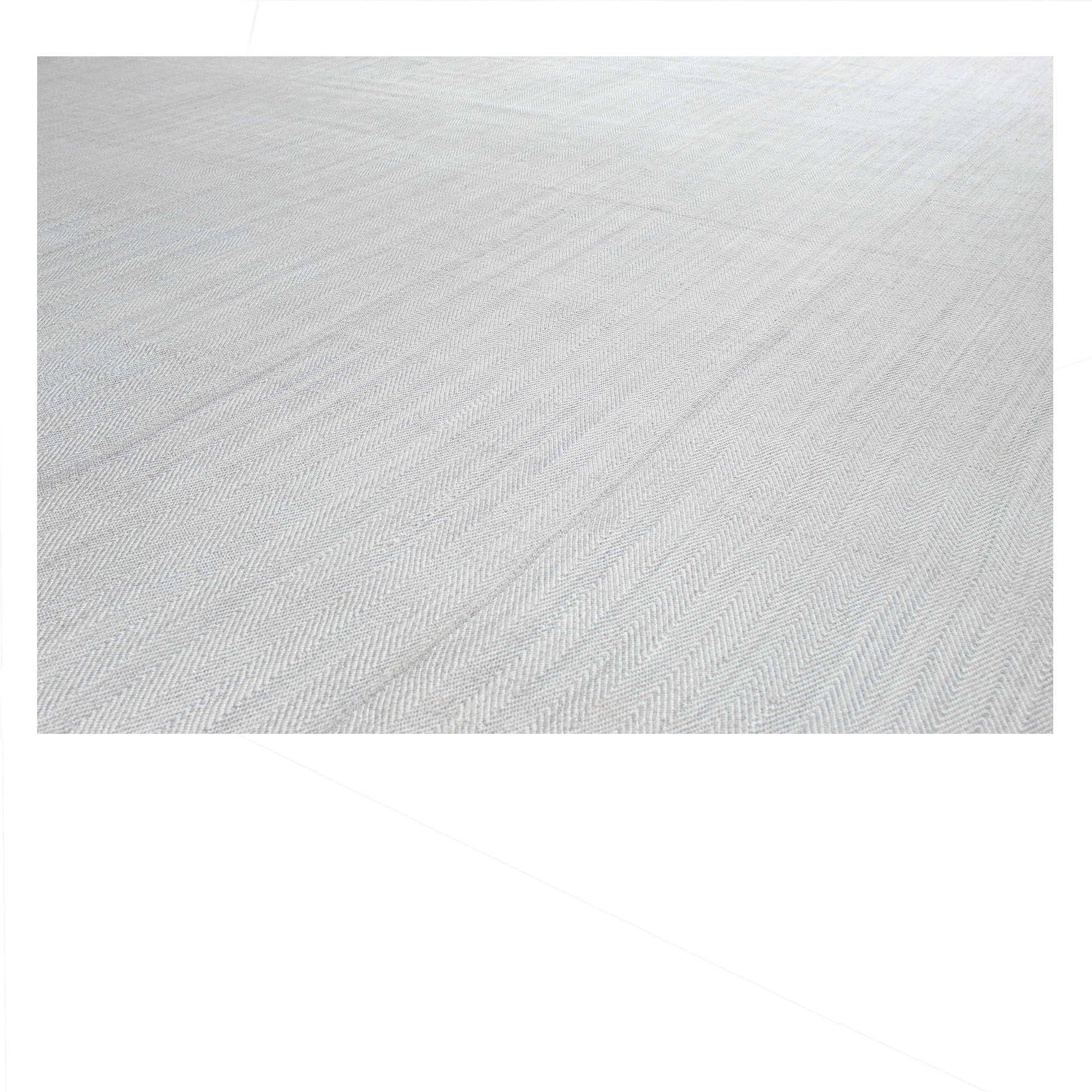 Herringbone rug is a hand-knotted transitional piece composed of hand-spun naturally dyed wool. 