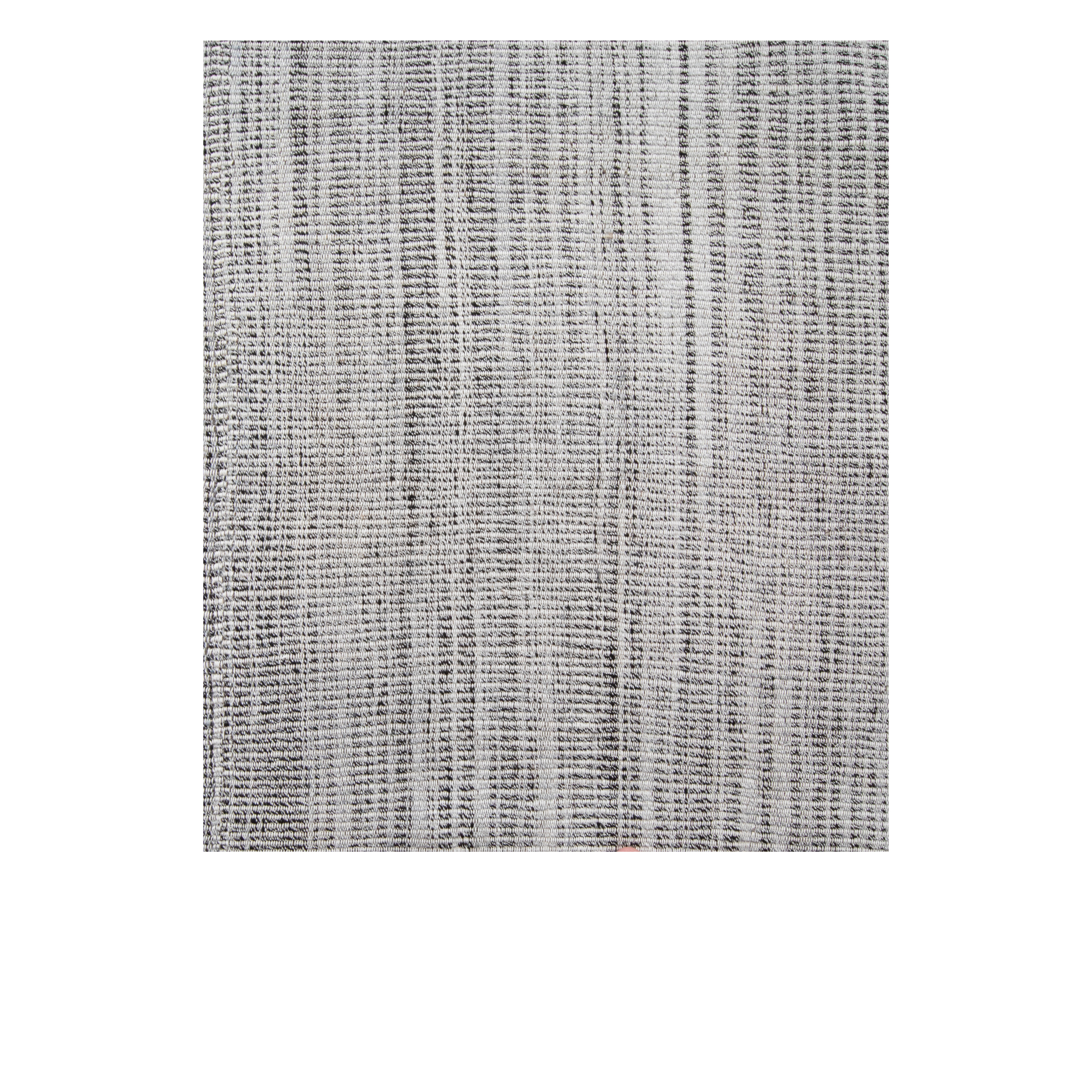This Charmo flatweave rug made from handspun wool and natural dyes. 