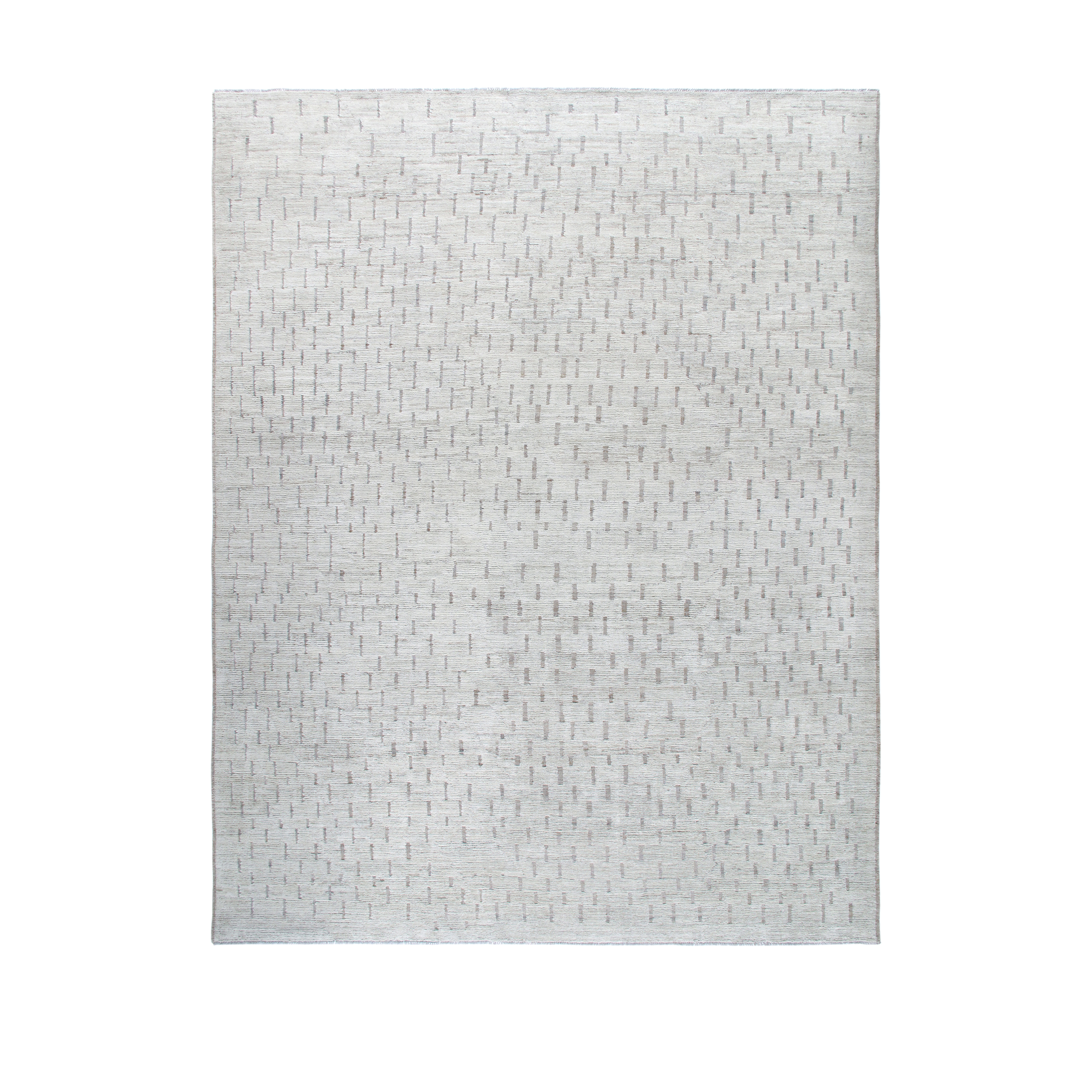 Marbella Rug is a hand-knotted modern piece with a combination of beige and grey tones. 