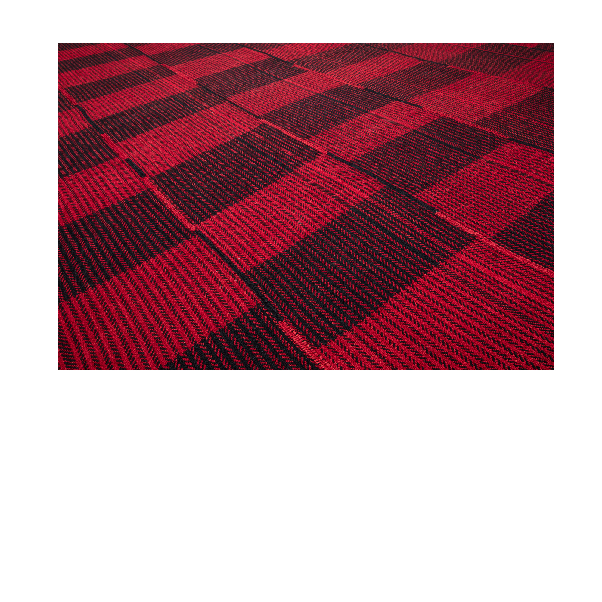 This Plaid rug is is hand-woven and made of 100% wool.