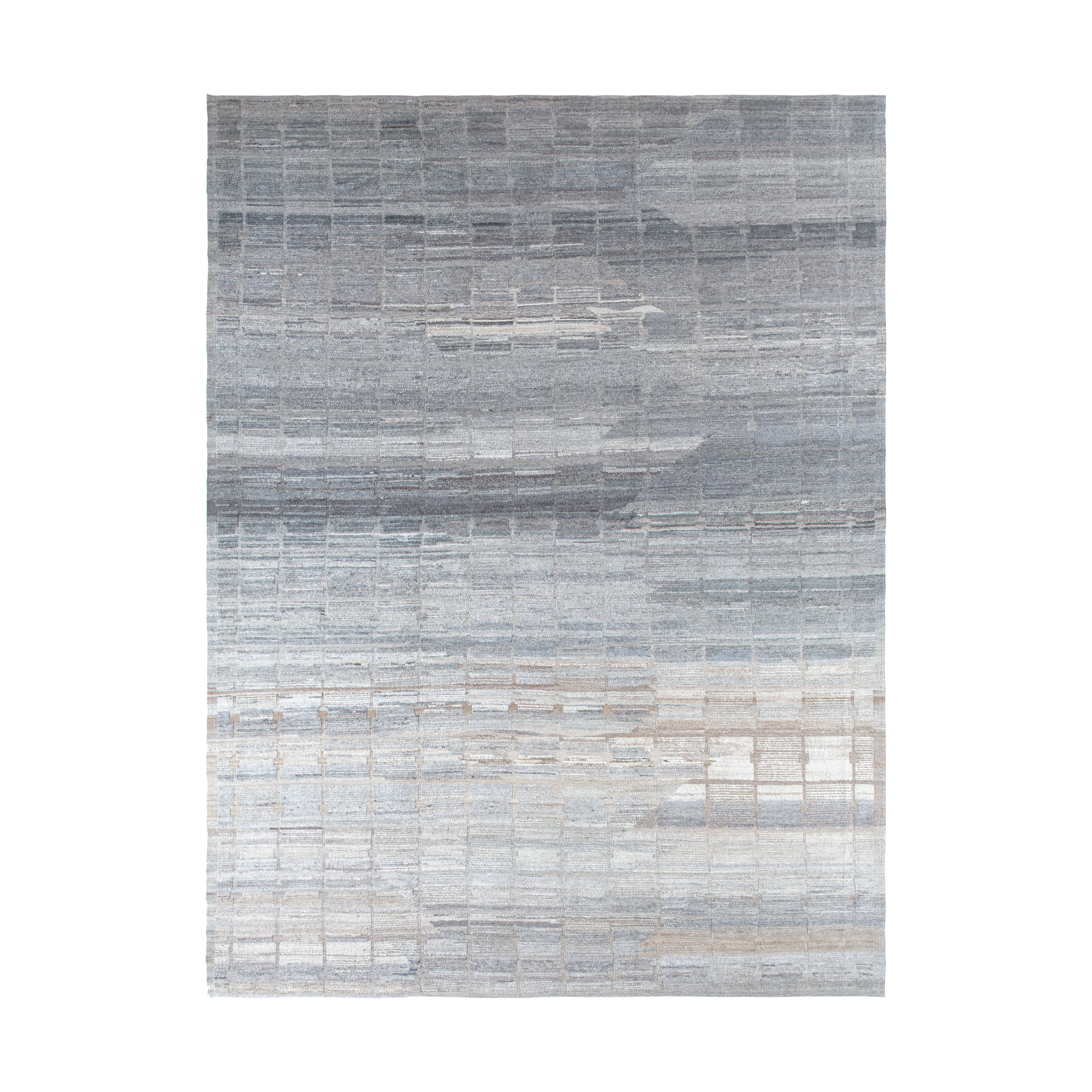 African rug that is hand-knotted from naturally dyed wool with subtle silk accents. 
