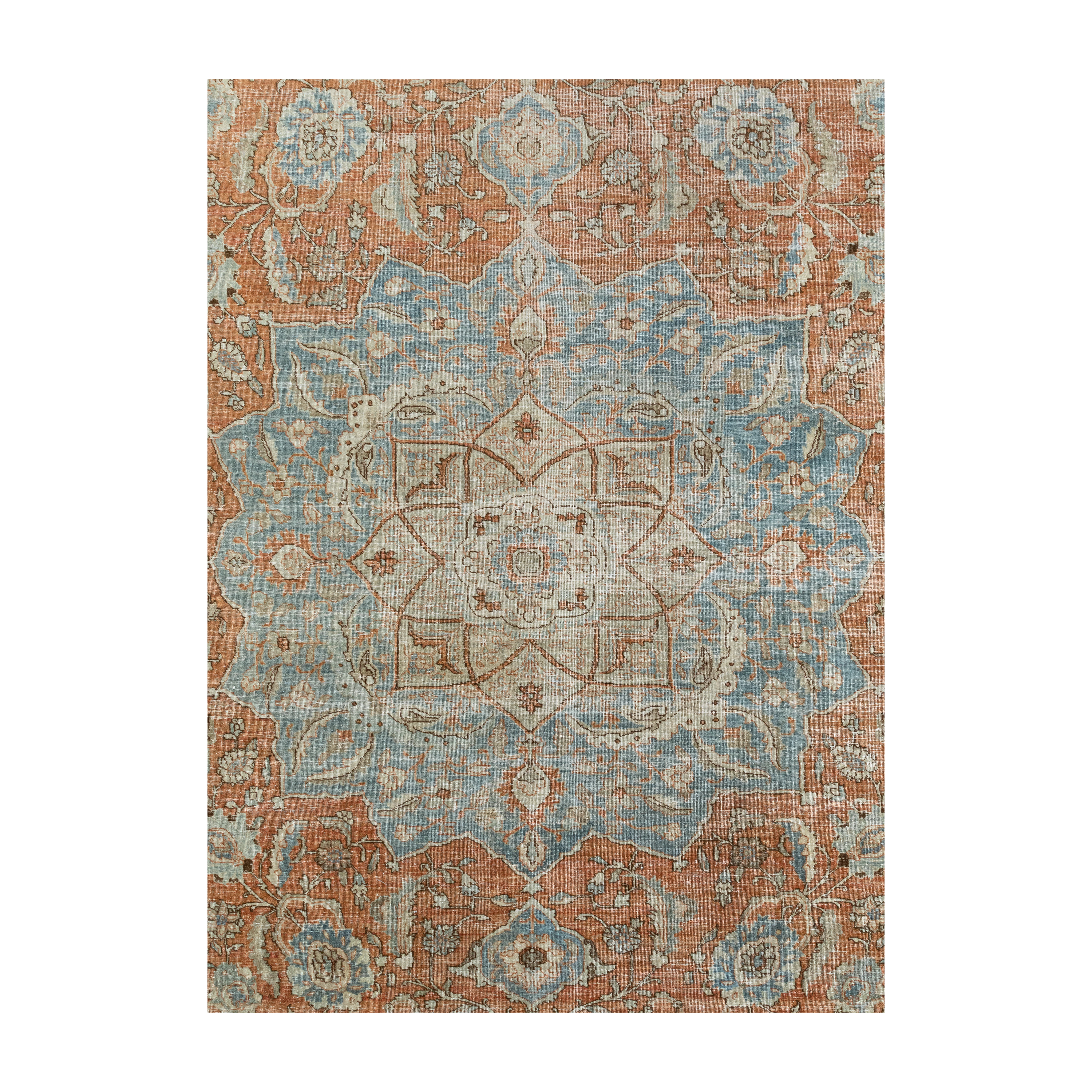 “Vintage Tabriz rug with medallion design in rust and blue tones, hand-knotted in Iran”