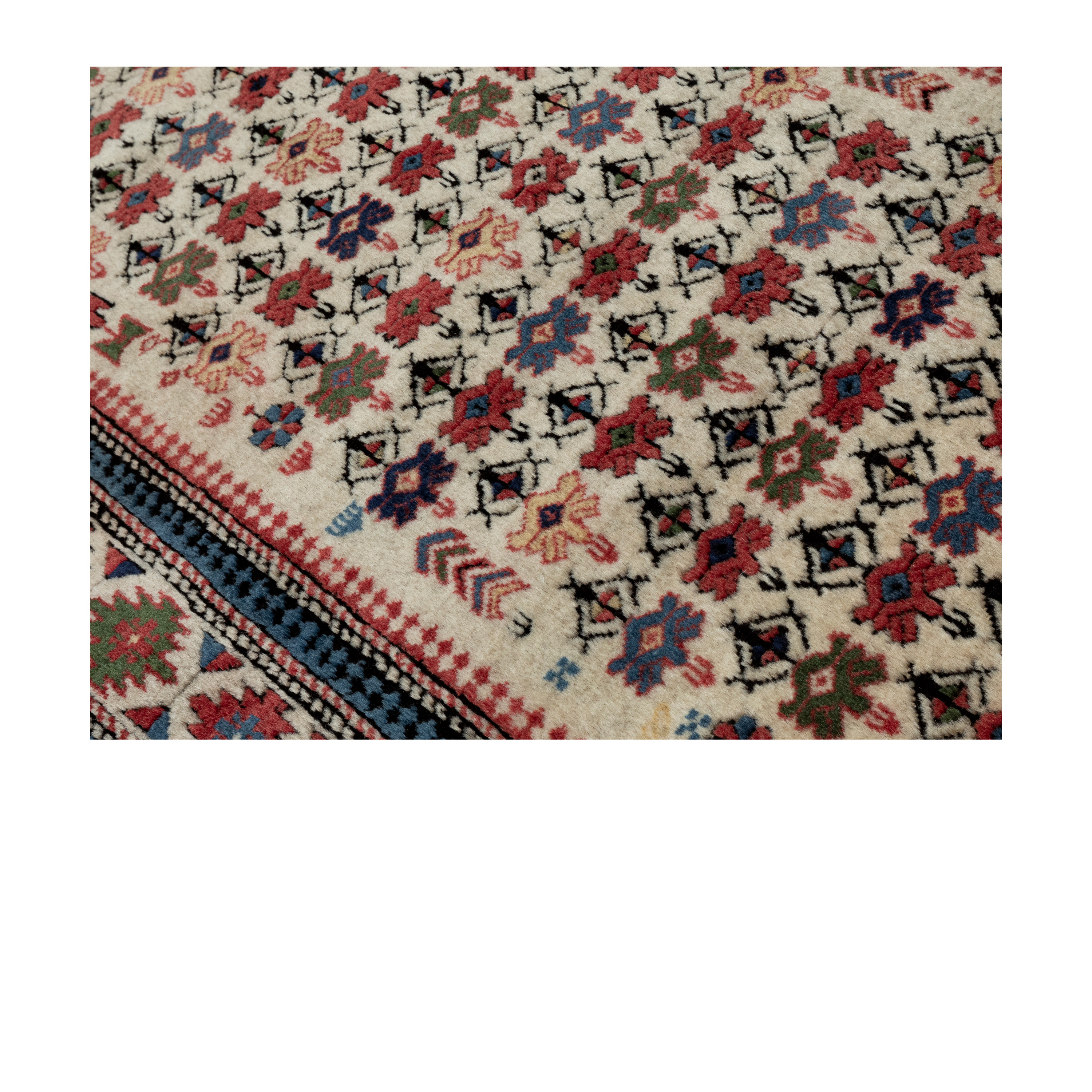 “Caucasian Shirvan-style rug with tribal medallions and ivory field, handwoven in Azerbaijan using hand-spun wool and natural dyes – heirloom reproduction by Nasiri Carpets”