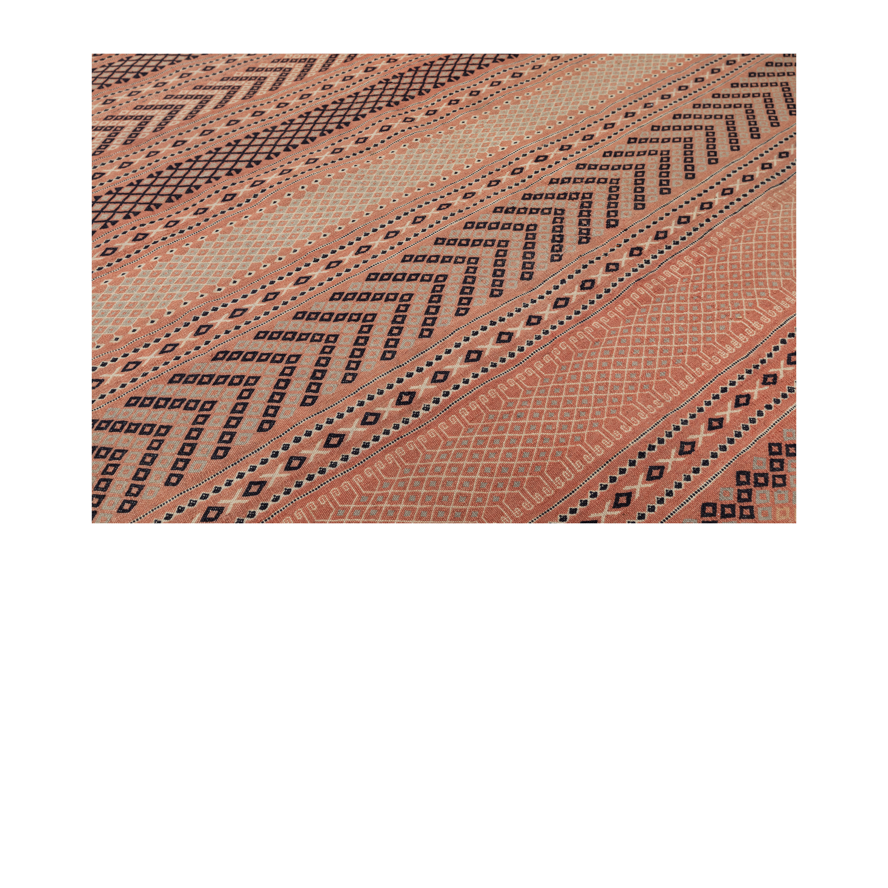 Vintage Persian flatweave rug in rust with geometric repeating motifs, handcrafted in wool and natural dye by Nasiri Carpets.