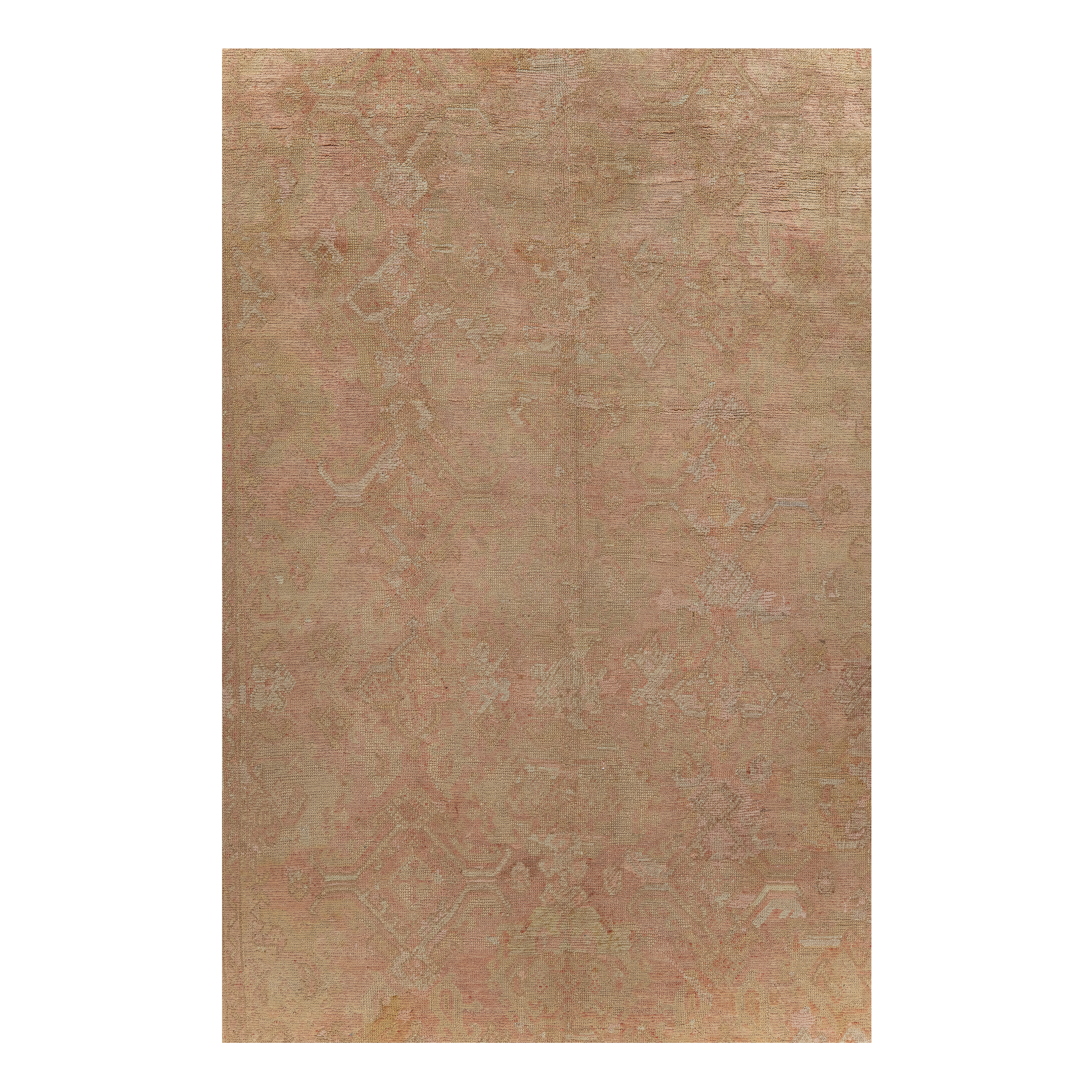 Oushak antique rug in salmon color, handwoven in Turkey with traditional design