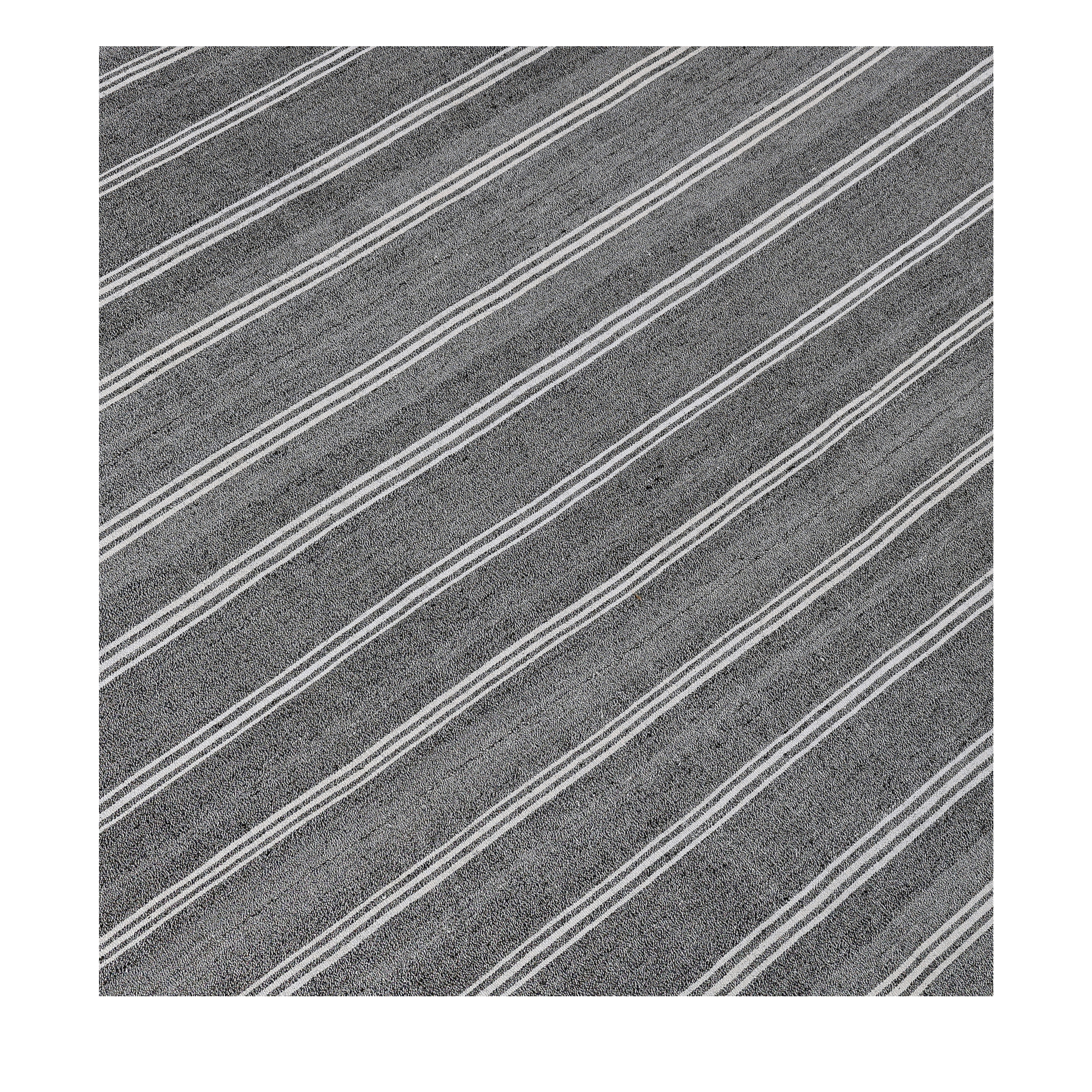 This Vintage flatweaves embody the minimalist sophistication that emerged in the mid-20th century which continues to thrive today.